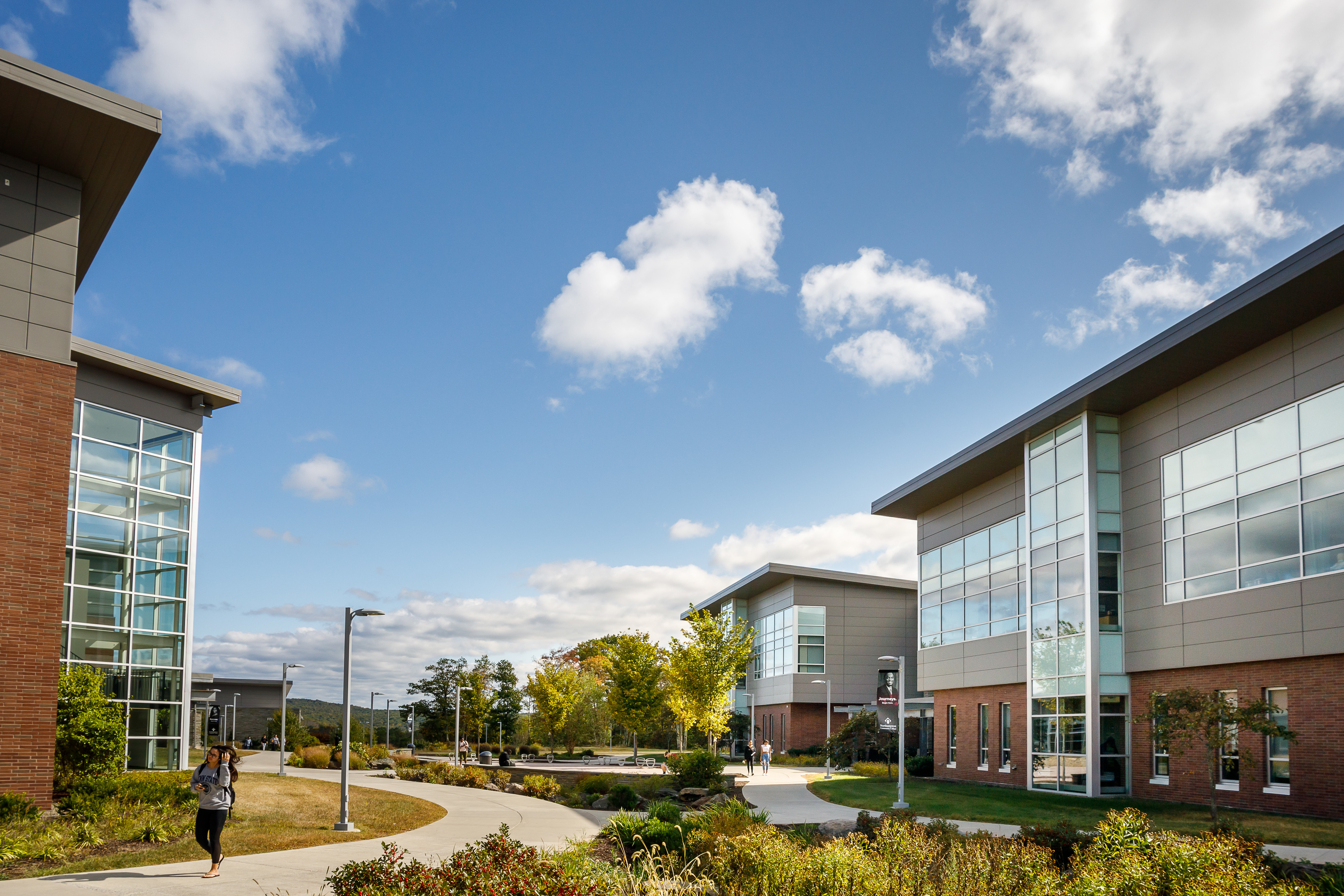 students walking across Pocono campus